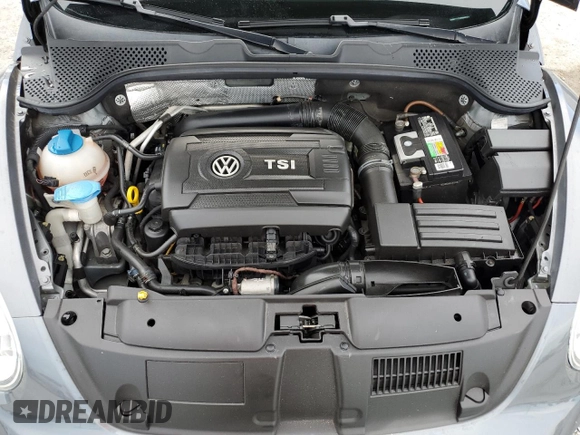 2014 Volkswagen Beetle Entry z VIN 3VWF17AT2EM642942, wystawiony jako Copart lot #60241445 z przebiegiem 70 780 mil mil oraz Szkoda całkowita • Salvage title. Historia ofert i sprzedaży dostępna na DreamBid. Obrazek 11.