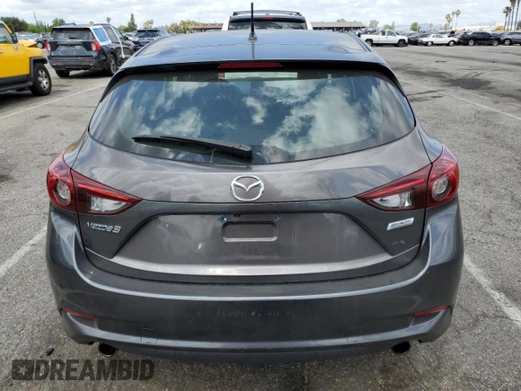 2018 Mazda 3 Touring z VIN 3MZBN1L38JM219466, wystawiony jako Copart lot #56766025 z przebiegiem 124 775 mil mil oraz Szkoda całkowita • Salvage title. Historia ofert i sprzedaży dostępna na DreamBid. Obrazek 6.
