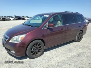 2007 Honda Odyssey Touring z VIN 5FNRL38897B051647, wystawiony jako Copart lot #57616905 z przebiegiem 222 966 mil mil oraz Szkoda całkowita • Salvage title. Historia ofert i sprzedaży dostępna na DreamBid. Obrazek 1.