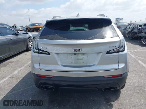2020 Cadillac XT4 FWD Sport with VIN 1GYFZER46LF122716, listed as a IAAI auction lot 41905824 with 51,986 mi miles and . Bid and sale history available at carsss.com. Image 16.
