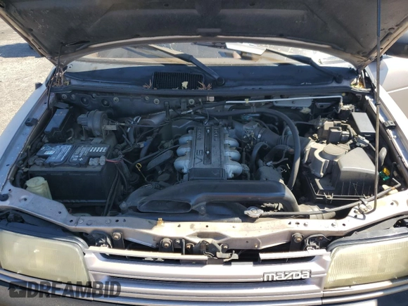 1992 Mazda MPV z VIN JM3LV5222N0453058, wystawiony jako Copart lot #72283634 z przebiegiem 174 084 mil mil oraz Szkoda całkowita • Salvage title. Historia ofert i sprzedaży dostępna na DreamBid. Obrazek 12.