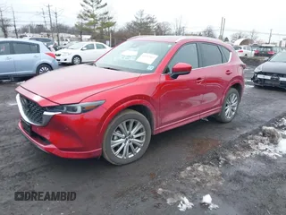 2023 Mazda CX-5 Signature with VIN JM3KFBXY3P0282456, listed as a IAAI auction lot 41542915 with 3,376 mi miles and . Bid and sale history available at carsss.com. Image 2.