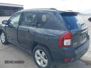 2015 Jeep Compass Sport with VIN 1C4NJDBBXFD151700, listed as a IAAI auction lot 41855482 with 124,822 mi miles. Bid and sale history available at carsss.com. Image 3.