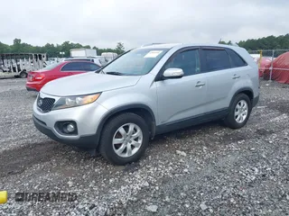 2013 Kia Sorento LX with VIN 5XYKTDA20DG347612, listed as a IAAI auction lot 42809304 with 115,452 mi miles and . Bid and sale history available at DreamBid. Image 2.