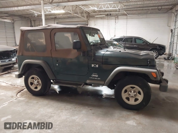 2003 Jeep Wrangler X z VIN 1J4FA39S43P339234, wystawiony jako IAAI lot #41329654 z przebiegiem 175 376 mil mil oraz . Historia ofert i sprzedaży dostępna na DreamBid. Obrazek 13.