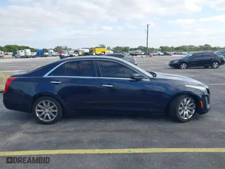 2016 Cadillac CTS Sedan RWD with VIN 1G6AP5SX8G0119984, listed as a IAAI auction lot 42098257 with 98,593 mi miles. Bid and sale history available at carsss.com. Image 13.
