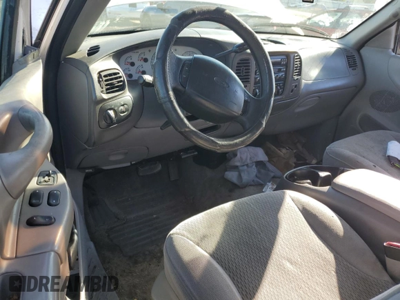 1997 Ford F-150 XL с VIN 1FTEX17L9VKB65855, выставлен на аукционе Copart как лот 87410414 с пробегом 198 005 миль миль и Списание • Salvage title. История ставок и продаж доступна на DreamBid. Изображение 8.