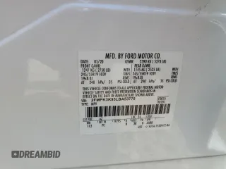 2020 Ford Edge Titanium with VIN 2FMPK3K93LBA53778, listed as a Copart auction lot 59059085 with 121,277 mi miles and Salvage title. Bid and sale history available at DreamBid. Image 13.