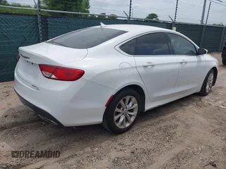 2015 Chrysler 200 C with VIN 1C3CCCCGXFN631935, listed as a IAAI auction lot 42144521 with 157,531 mi miles. Bid and sale history available at carsss.com. Image 4.