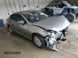 2015 Mazda 3 i Grand Touring z VIN 3MZBM1W7XFM155147, wystawiony jako Copart lot #58413555 z przebiegiem 111 318 mil mil oraz Szkoda całkowita • Salvage title. Historia ofert i sprzedaży dostępna na DreamBid. Obrazek 4.