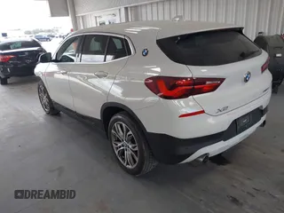 2022 BMW X2 sDrive28i z VIN WBXYH9C08N5U29086, wystawiony jako IAAI lot #42119627 z przebiegiem 76 364 mil mil oraz . Historia ofert i sprzedaży dostępna na DreamBid. Obrazek 3.