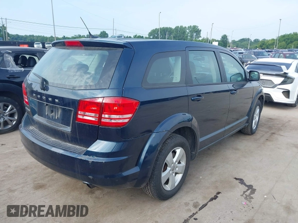 2013 Dodge Journey American Value with VIN 3C4PDCAB2DT529530, listed as a IAAI auction lot 42798001 with Not provided miles and . Bid and sale history available at DreamBid. Image 4.