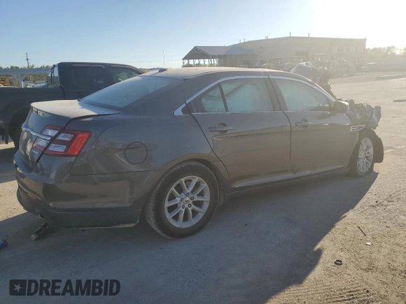 2015 Ford Taurus SE with VIN 1FAHP2D80FG116704, listed as a Copart auction lot 73571034 with 85,665 mi miles and Salvage Title. Bid and sale history available at DreamBid. Image 3.