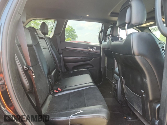 2018 Jeep Grand Cherokee Laredo E z VIN 1C4RJFAGXJC287415, wystawiony jako Copart lot #64182975 z przebiegiem 103 817 mil mil oraz Szkoda całkowita • Salvage title. Historia ofert i sprzedaży dostępna na DreamBid. Obrazek 11.