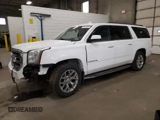 2015 GMC Yukon XL SLT z VIN 1GKS2HKC4FR545409, wystawiony jako Copart lot #55401425 z przebiegiem 214 848 mil mil oraz Czysty tytuł • Clean title. Historia ofert i sprzedaży dostępna na DreamBid. Obrazek 1.