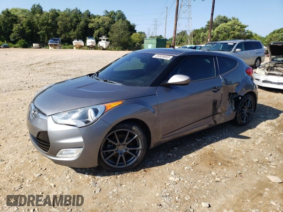 2016 Hyundai Veloster with VIN KMHTC6AD7GU248608, listed as a Copart auction lot 65809693 with 104,784 mi miles. Bid and sale history available at carsss.com. Image 1.