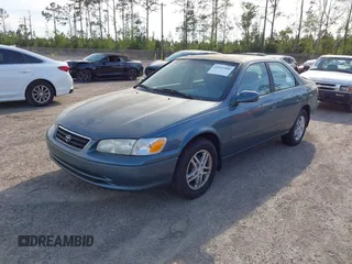 2001 Toyota Camry CE with VIN 4T1BG28K91U852861, listed as a IAAI auction lot 41912480 with 217,404 mi miles. Bid and sale history available at carsss.com. Image 2.