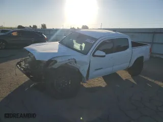 2021 Toyota Tacoma 4WD SR with VIN 3TMCZ5AN7MM390091, listed as a Copart auction lot 42782035 with 56,689 mi miles and Salvage Title. Bid and sale history available at carsss.com. Image 1.