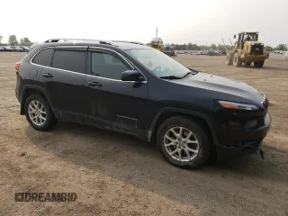 2016 Jeep Cherokee Latitude with VIN 1C4PJMCS0GW223341, listed as a Copart auction lot 58971355 with 233,488 mi miles and Clean title. Bid and sale history available at DreamBid. Image 4.