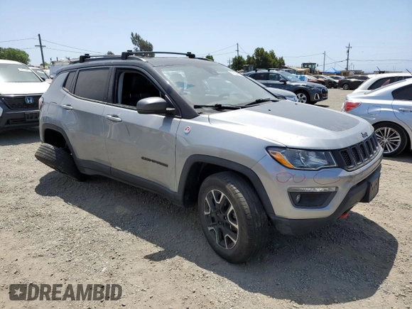 2021 Jeep Compass Trailhawk with VIN 3C4NJDDB6MT564816, listed as a Copart auction lot 57534505 with 87,177 mi miles and Salvage title. Bid and sale history available at DreamBid. Image 4.