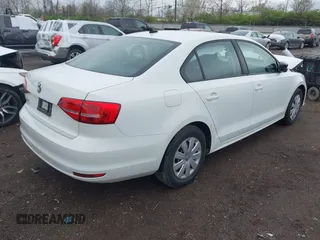 2015 Volkswagen Jetta Sedan 2.0L S with VIN 3VW2K7AJ5FM313969, listed as a IAAI auction lot 41951550 with 104,735 mi miles. Bid and sale history available at carsss.com. Image 4.