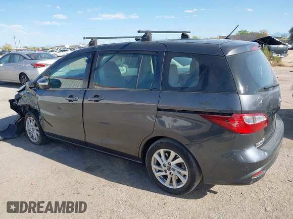 2013 Mazda 5 Sport with VIN JM1CW2BL4D0145725, listed as a IAAI auction lot 42190177 with 143,209 mi miles and . Bid and sale history available at DreamBid. Image 14.