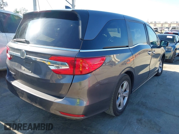 2018 Honda Odyssey EX with VIN 5FNRL6H53JB099188, listed as a IAAI auction lot 42239774 with 90,469 mi miles and . Bid and sale history available at DreamBid. Image 4.
