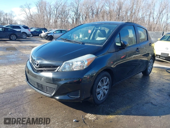 2012 Toyota Yaris L with VIN JTDKTUD31CD500337, listed as a IAAI auction lot 41410723 with 130,881 mi miles. Bid and sale history available at carsss.com. Image 2.