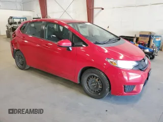 2015 Honda Fit LX with VIN 3HGGK5G55FM780043, listed as a Copart auction lot 69003154 with 141,424 mi miles and Salvage Title. Bid and sale history available at carsss.com. Image 4.