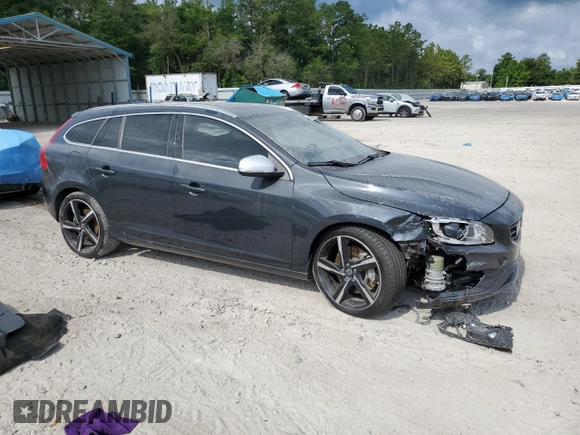 2015 Volvo V60 z VIN YV1902SS6F1227756, wystawiony jako Copart lot #57962725 z przebiegiem 62 542 mil mil oraz Szkoda całkowita • Salvage title. Historia ofert i sprzedaży dostępna na DreamBid. Obrazek 4.