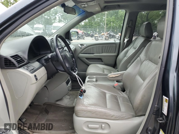 2006 Honda Odyssey EX-L z VIN 5FNRL38706B019434, wystawiony jako Copart lot #57397755 z przebiegiem 175 406 mil mil oraz Szkoda całkowita • Salvage title. Historia ofert i sprzedaży dostępna na DreamBid. Obrazek 7.
