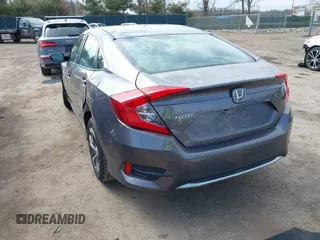 2019 Honda Civic LX with VIN 19XFC2F61KE037495, listed as a IAAI auction lot 41891007 with 90,262 mi miles and . Bid and sale history available at DreamBid. Image 3.