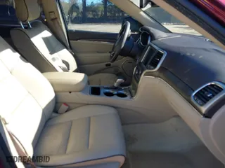 2017 Jeep Grand Cherokee Overland with VIN 1C4RJECG7HC823478, listed as a IAAI auction lot 41367186 with 82,873 mi miles. Bid and sale history available at carsss.com. Image 5.