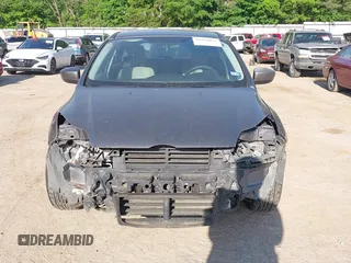 2012 Ford Focus SE with VIN 1FAHP3K28CL308346, listed as a IAAI auction lot 42034073 with 182,387 mi miles and . Bid and sale history available at carsss.com. Image 6.