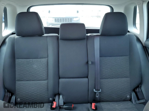 2013 Volkswagen Tiguan S с VIN WVGBV3AX6DW592011, выставлен на аукционе Copart как лот 59802095 с пробегом 112 485 миль миль и Списание • Salvage title. История ставок и продаж доступна на DreamBid. Изображение 10.