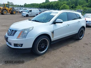 2013 Cadillac SRX Performance Collection with VIN 3GYFNHE3XDS520177, listed as a IAAI auction lot 42536457 with 217,963 mi miles and . Bid and sale history available at DreamBid. Image 2.