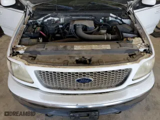 2001 Ford F-150 SuperCrew XLT with VIN 1FTRW08L21KE03150, listed as a Copart auction lot 67372004 with 184,124 mi miles and Salvage Title. Bid and sale history available at carsss.com. Image 11.