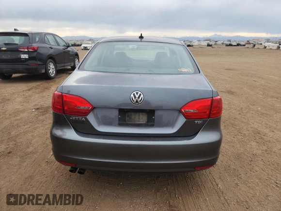 2012 Volkswagen Jetta TDI w/Premium with VIN 3VWLL7AJ7CM040711, listed as a Copart auction lot 51310265 with 245,720 mi miles and Clean title. Bid and sale history available at DreamBid. Image 6.