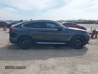 2020 BMW X4 xDrive30i z VIN 5UX2V1C02L9B74309, wystawiony jako IAAI lot #41825211 z przebiegiem 54 049 mil mil oraz . Historia ofert i sprzedaży dostępna na DreamBid. Obrazek 13.