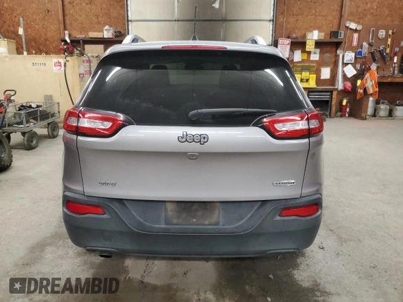 2018 Jeep Cherokee Latitude Plus z VIN 1C4PJLLB7JD590136, wystawiony jako Copart lot #64295715 z przebiegiem 143 699 mil mil oraz Szkoda całkowita • Salvage title. Historia ofert i sprzedaży dostępna na DreamBid. Obrazek 6.