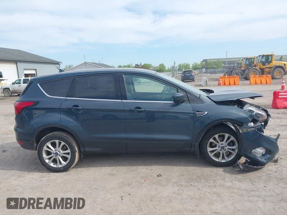 2019 Ford Escape SE z VIN 1FMCU0GD2KUB98923, wystawiony jako IAAI lot #42245972 z przebiegiem 91 193 mil mil oraz . Historia ofert i sprzedaży dostępna na DreamBid. Obrazek 13.