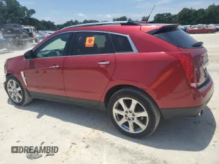 2012 Cadillac SRX Premium Collection with VIN 3GYFNCE39CS518034, listed as a Copart auction lot 65373925 with 50,684 mi miles and Salvage title. Bid and sale history available at DreamBid. Image 2.