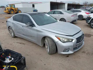 2014 Infiniti Q50 with VIN JN1BV7AP0EM681679, listed as a IAAI auction lot 41371773 with 141,940 mi miles. Bid and sale history available at carsss.com. Image 1.