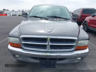 2003 Dodge Dakota SLT with VIN 1D7HL48N93S190381, listed as a IAAI auction lot 41921335 with 75,088 mi miles. Bid and sale history available at carsss.com. Image 10.