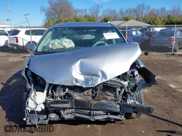 2012 Toyota Sienna XLE with VIN 5TDDK3DC6CS045009, listed as a IAAI auction lot 41790571 with 154,817 mi miles. Bid and sale history available at carsss.com. Image 13.