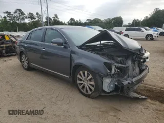 2011 Toyota Avalon with VIN 4T1BK3DBXBU413941, listed as a Copart auction lot 57725185 with 130,348 mi miles and Salvage title. Bid and sale history available at DreamBid. Image 4.