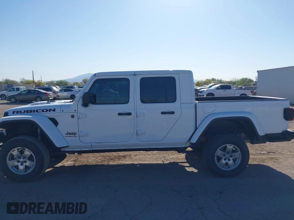 2020 Jeep Gladiator Rubicon with VIN 1C6JJTBG6LL187235, listed as a IAAI auction lot 42010374 with Not Provided miles and . Bid and sale history available at DreamBid. Image 14.