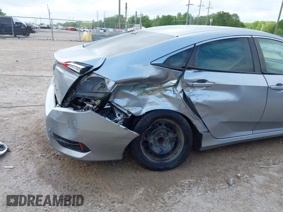 2019 Honda Civic LX with VIN 19XFC2F60KE043806, listed as a IAAI auction lot 41915894 with 123,141 mi miles and . Bid and sale history available at DreamBid. Image 6.