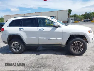 2014 Jeep Grand Cherokee Limited with VIN 1C4RJFBG5EC132159, listed as a IAAI auction lot 42604916 with 248,954 mi miles and . Bid and sale history available at DreamBid. Image 13.