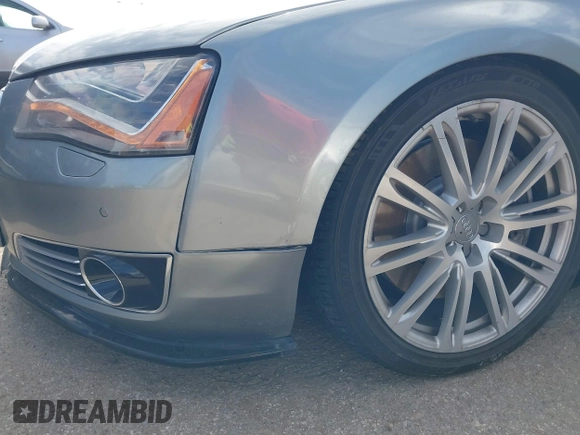 2011 Audi A8 with VIN WAUAVAFD5BN021080, listed as a IAAI auction lot 41223418 with 80,538 mi miles and . Bid and sale history available at DreamBid. Image 6.